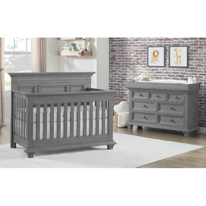 Grey crib and outlet dresser